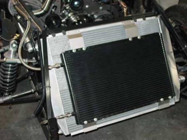 Oversized condenser with custom brackets.,  Air Conditioning